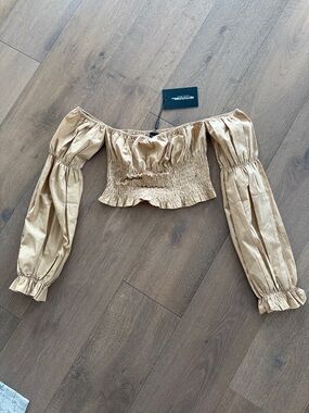 Pretty little thing off the shoulder top